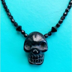 Bought in Portmore Jamaica skull necklace